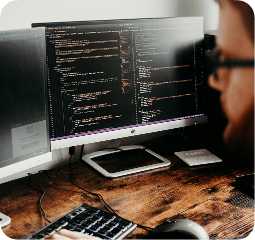 Person working at computer monitors